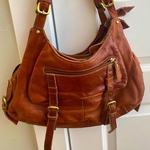 Brown leather bag from Anthropologie.